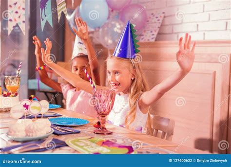 Happy Kids Making Funny Movements while Sitting at the Table Stock Photo - Image of cafe, mood ...