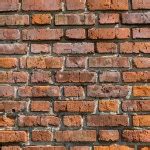 Red brick wall texture grunge background with vignetted corners to interior design — Stock Photo ...