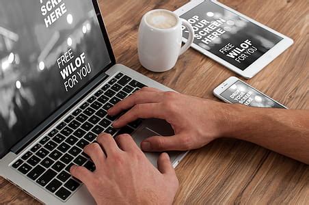 Royalty-Free photo: MacBook Air beside space gray iPhone 6 on top of table | PickPik