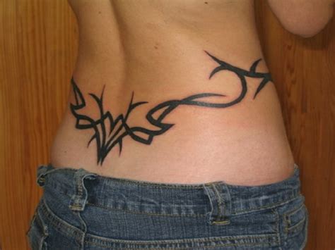 20 Awesome Lower Back Tribal Tattoos