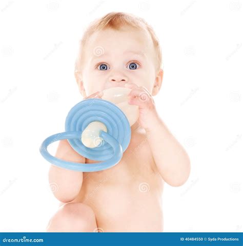 Baby boy with big pacifier stock photo. Image of clean - 40484550