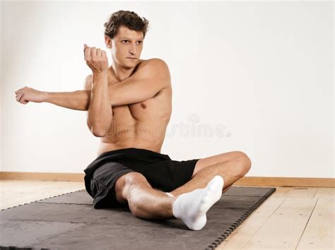 Man Stretching Shoulder Muscles Stock Photo - Image of shoulder, stretch: 54644052