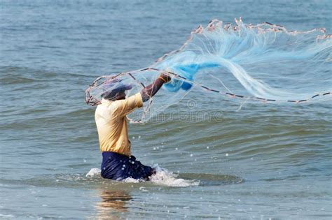 Fisherman catch fish editorial photography. Image of fishing - 58078387