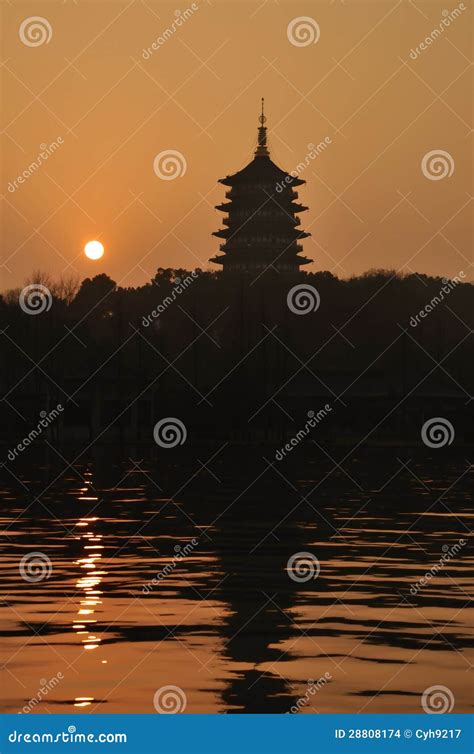 Sunset Glow at Leifeng Pagoda Stock Photo - Image of sunshine, tree ...