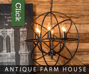 an antique farm house chandelier with candles in the center and wooden wall behind it