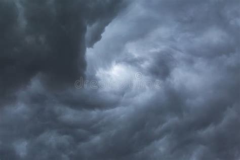 Dark Storm Clouds before Rain. Blurred Swirl in the Dark Storm Clouds ...