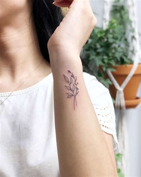 Update 82+ delicate flower wrist tattoos latest - esthdonghoadian