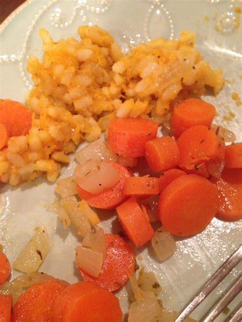 Butternut squash risotto (frozen bag from Trader Joes) with a side of oregano spiced carrots and ...