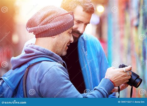 Two happy friends outdoors stock image. Image of happiness - 70971537