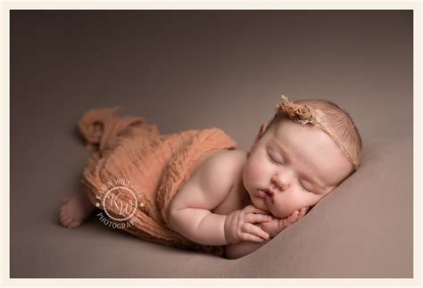 How old should a baby be at their newborn baby photoshoot?