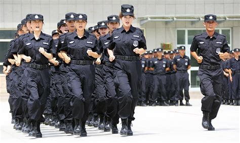 A Chinese police SWAT team trains in Hami, Xinjiang province ...