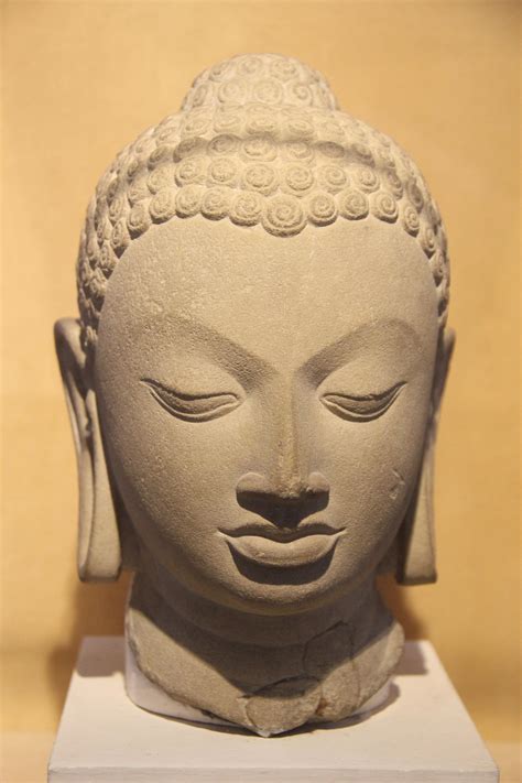 A Buddha head sculpture from the Gupta dynasty in India. 5th Century AD, found in Sarnath in ...