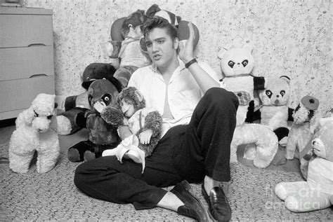 Elvis Presley hanging out with a bunch of teddy bears, 1956 : OldSchoolCool