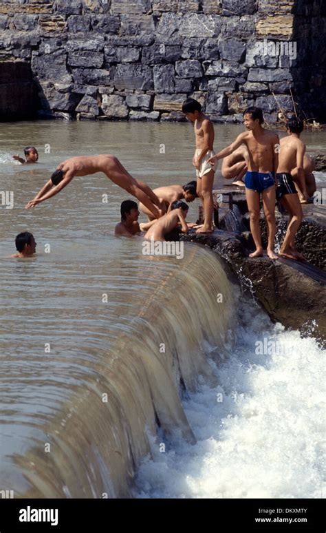 Group boys swim in river hi-res stock photography and images - Alamy