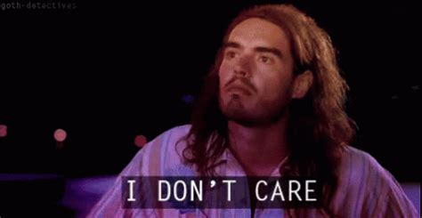 I Don't Care GIF - RussellBrand IDontCare IDC - Discover & Share GIFs