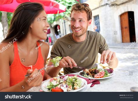 Restaurant Tourists Couple Eating At Outdoor Cafe. Summer Travel People Eating Healthy Food ...