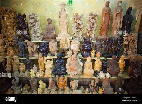 Vietnam, Hoi An, Wood Carving Statues at the Handicraft Workshop Stock Photo - Alamy