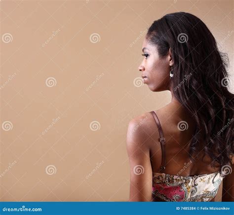 Woman Looking Over Her Shoulder Stock Images - Image: 7485384