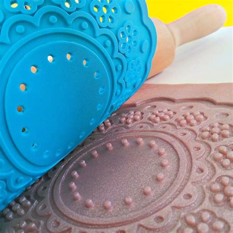 Silicon coaster rolled into playdough. Can also do this with doilies. Silicone Coasters ...