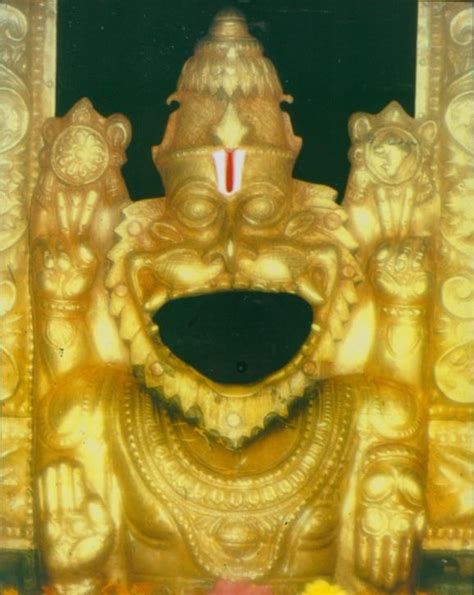 Two close up photos of the Pana Narasimha Deity situated in the hills at Mangalagiri. His open ...