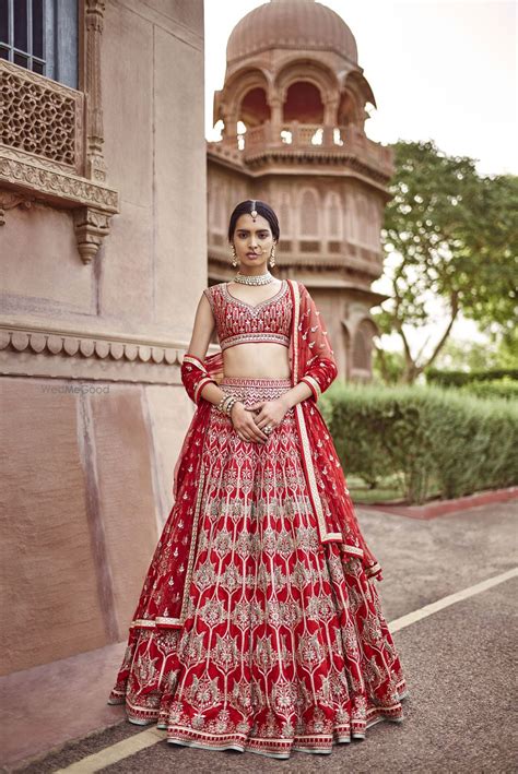 Photo of Anita dongre light red bridal lehenga