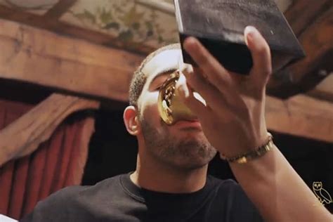 Drake drinks shots out of his Grammy award to promote new album - watch