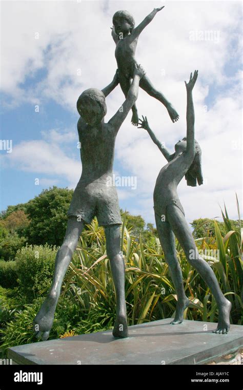 bronze sculpture of children playing Stock Photo - Alamy