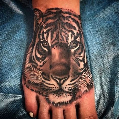 Tiger Portrait Hand Tattoo by Kris Kezart | Remington Tattoo Parlor