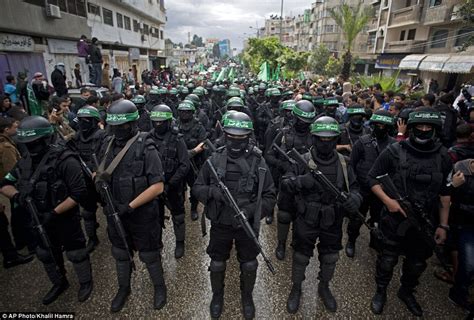 Hamas parades 2,000 armed fighters to mark its 27th anniversary | Daily Mail Online