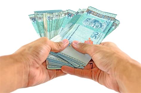 Asian man counting some cash 12561341 Stock Photo at Vecteezy