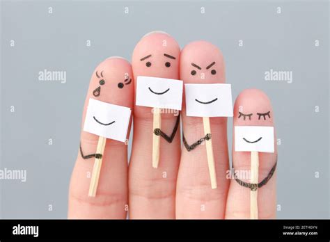 Fingers art of family. Concept of people hiding emotions Stock Photo - Alamy