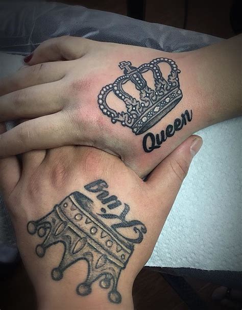 A stylized pair of king and queen crowns tattoos on hand. Crown Hand ...