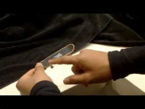 How to do a kickflip on a fingerboard / tech deck (Slow motion) - YouTube