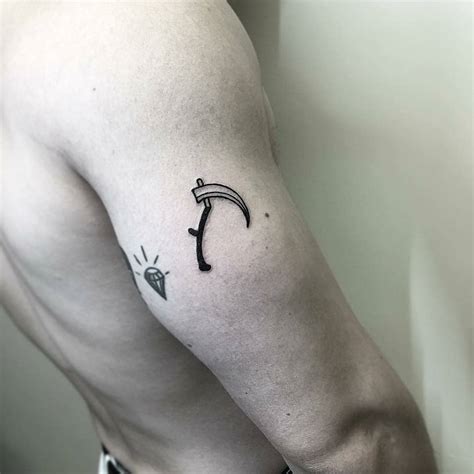 Small scythe tattoo - Tattoogrid.net