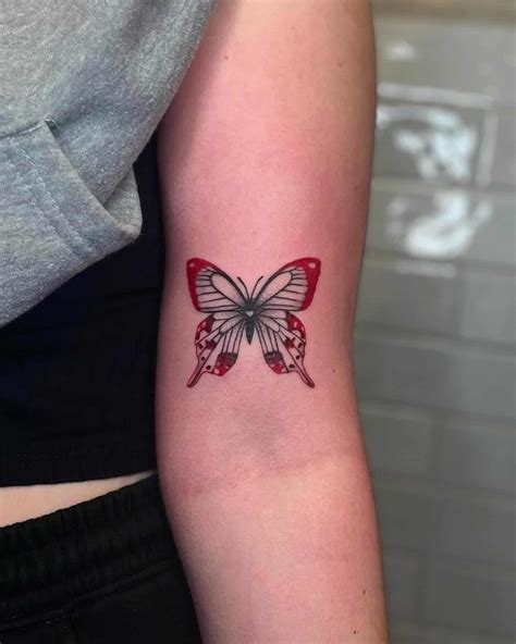 Share more than 69 black and red butterfly tattoos best - in.cdgdbentre