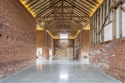 Decrepit farm buildings reborn into modern energy-efficient home in Suffolk