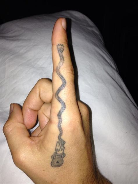 Russell Brand Hand Tattoo