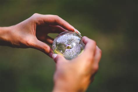 Crystal ball in hands · Free Stock Photo