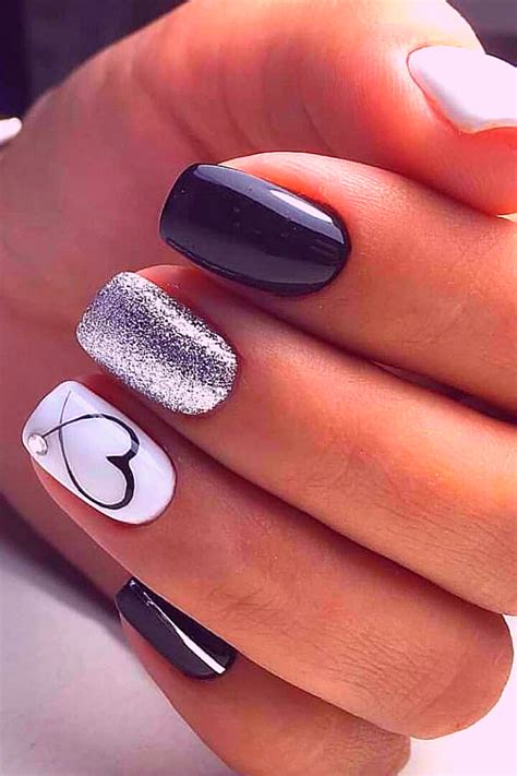 Amazing black and white valentines day nails with hearts and glitter! #valentinenails # ...