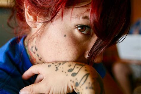 Close-up Photo of Woman with Tattoos · Free Stock Photo
