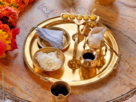 Puja tray and accessories for worship in the Hare Krishna temple. Stock Photo | Adobe Stock