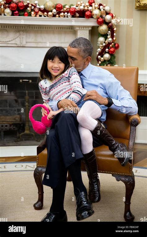 U.S President Barack Obama snuggles with his niece Savita Ng after his ...