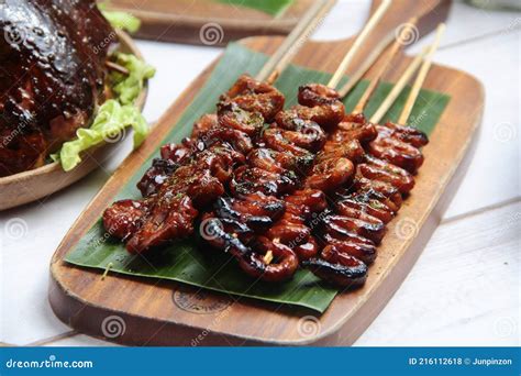 Freshly Cooked Filipino Food Called Isaw or Grilled Chicken Intestine ...