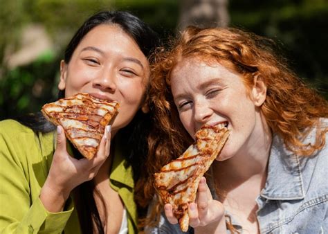 Free Photo | Friends eating together some street food