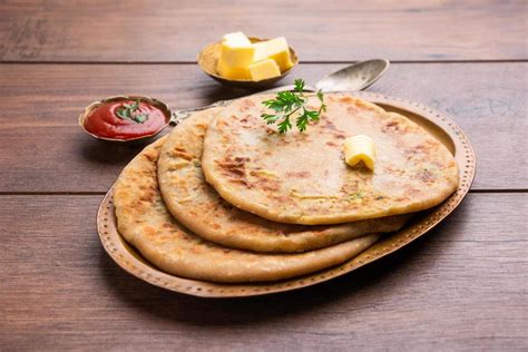 Aloo Gobi Paratha 16585247 Stock Photo at Vecteezy