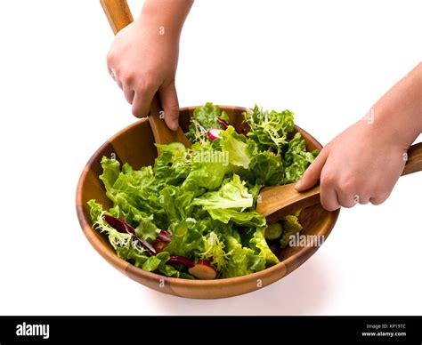 Tossing salad hi-res stock photography and images - Alamy