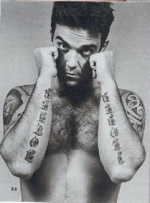 tattooed celebrity: Robbie Williams Tattoos