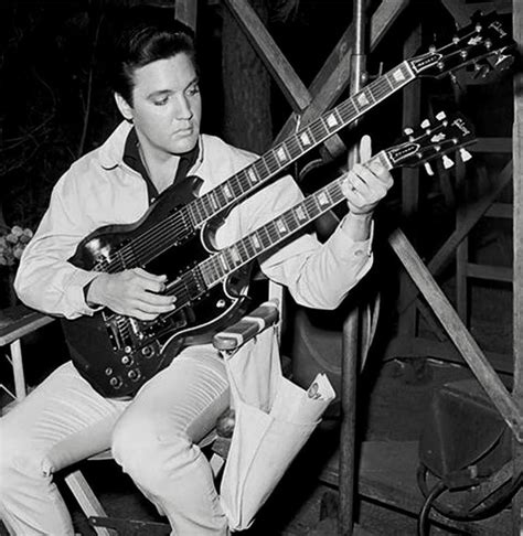 Elvis Presley playing a double-neck Gibson guitar. #Elvis #ElvisPresley #Gibson Vintage Les Paul ...