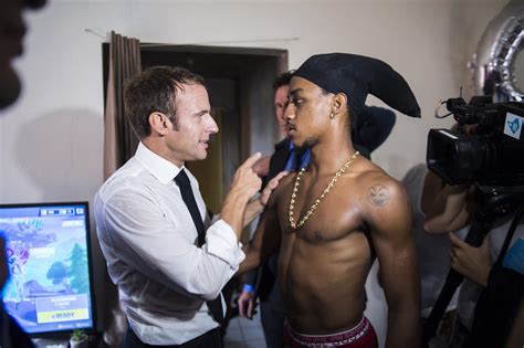 Macron criticized for photo with teen making obscene gesture | AM 880 The Biz - Miami, FL