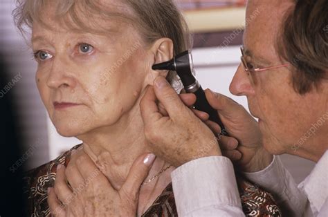 Ear examination - Stock Image - M920/1186 - Science Photo Library